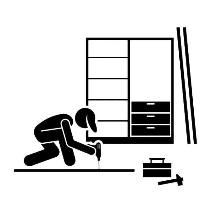 Person assembling a cabinet with a power drill; toolbox and hammer on the floor.