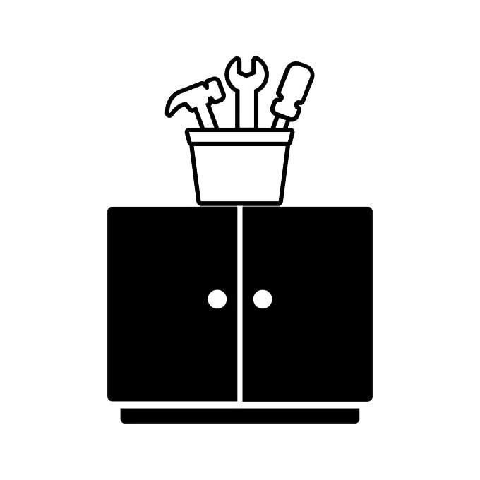 Black cabinet with tool bucket on top containing hammer, wrench, and screwdriver.