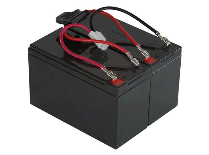A black battery with red and black wires attached to it