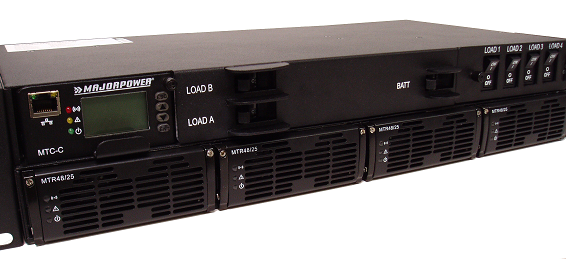 A black server is sitting on top of a white surface.