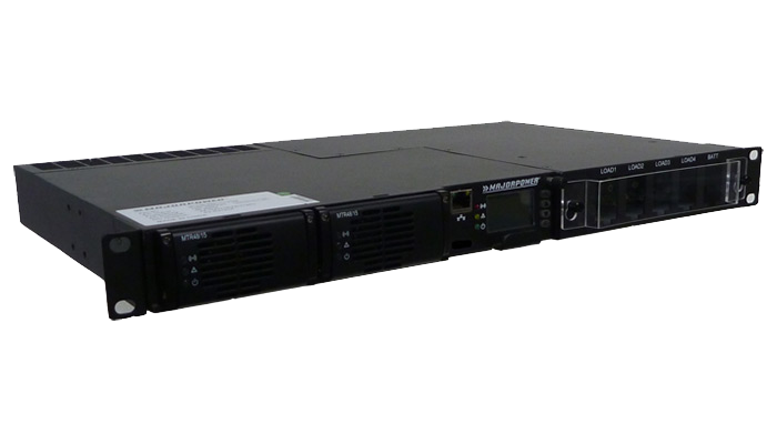 A black server is sitting on top of a white surface.