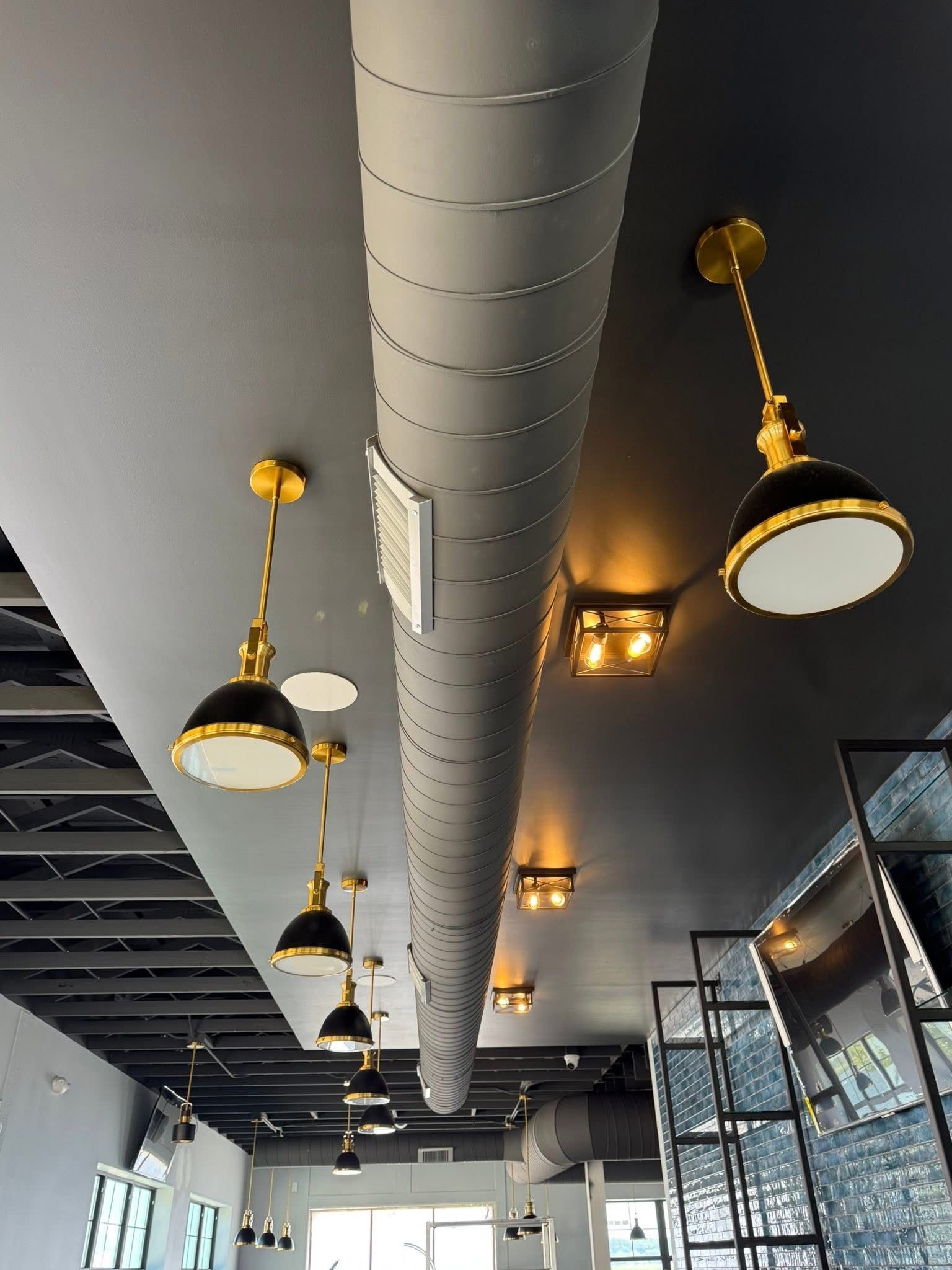 A picture of a mountain in a frame on a gray background.