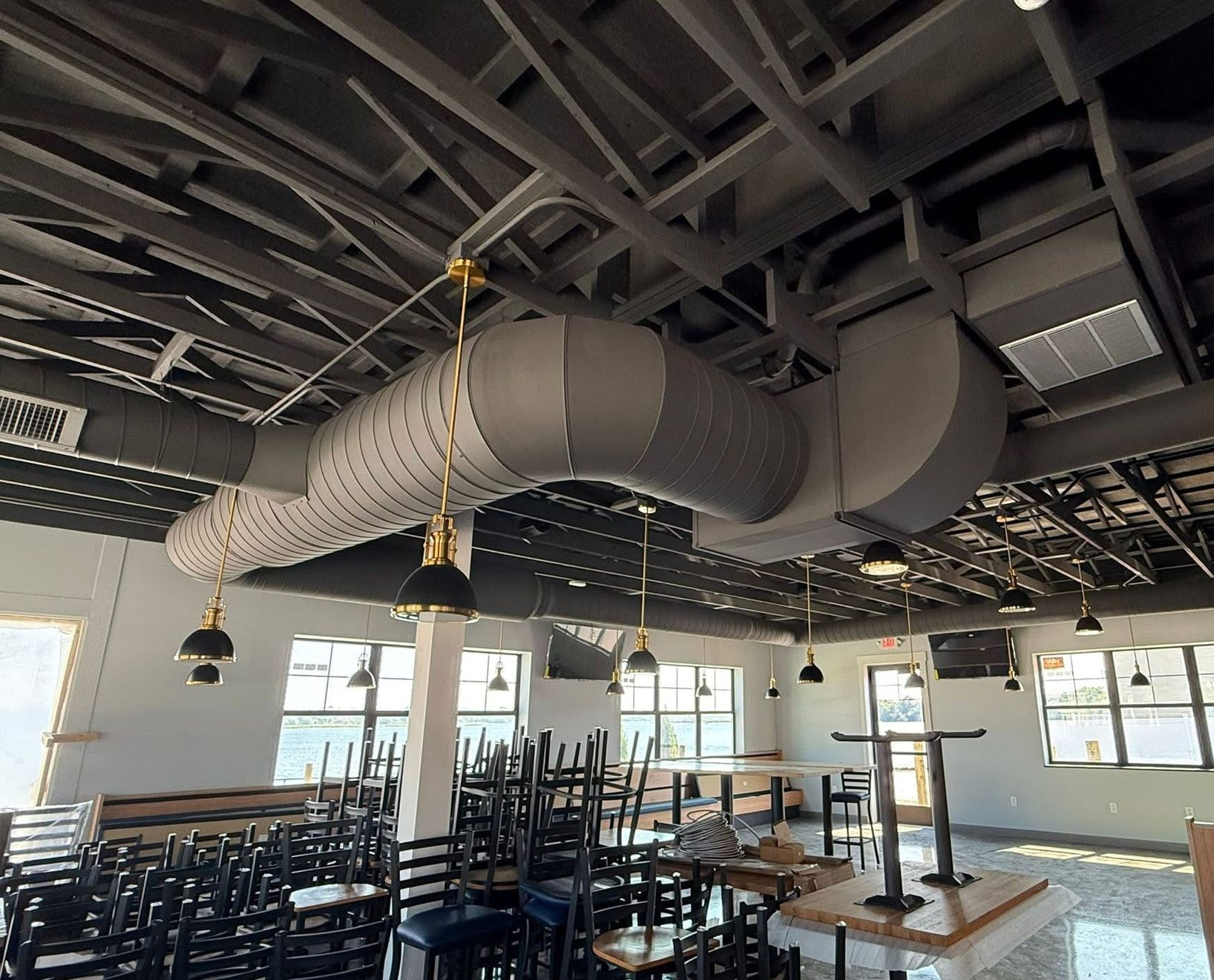 A picture of a mountain in a frame on a gray background.