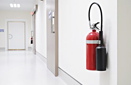 Fire extinguisher installed on wall