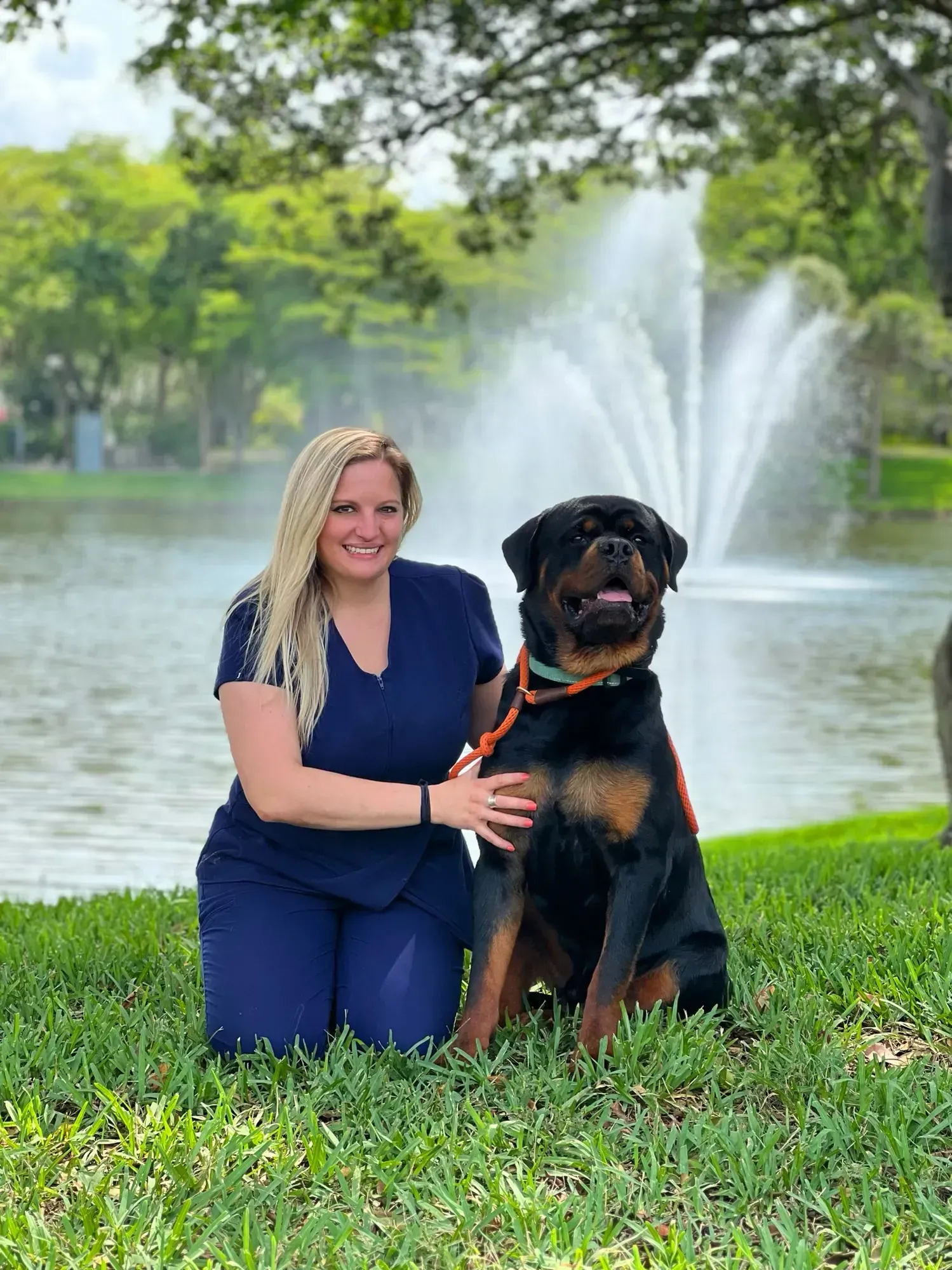 Dr. Jennifer Frione with a large dog at Lakeside Animal Hospital