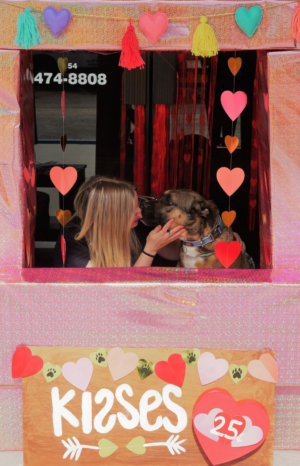 Dr. Frione and her Dog in the Lakeside Animal Hospital Kissing Booth