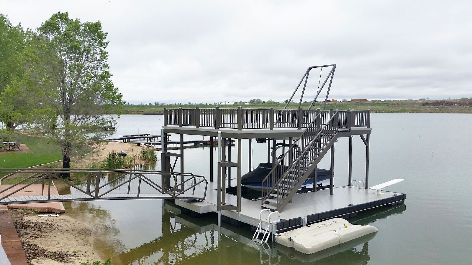 Granite gray decking, burnished slate railings & spud pole collars - Dock Solutions of Kentucky | Lexington, KY