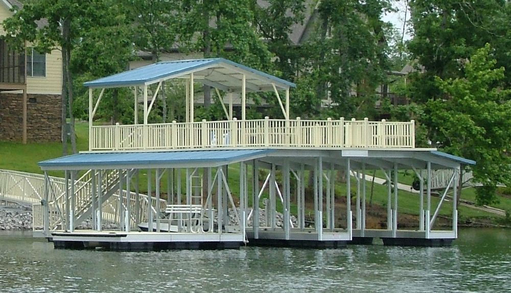 Buckskin decking and railings with hawaiian roof. Shown with swim platform, swim ladder, and dock bench. - Dock Solutions of Kentucky | Lexington, KY