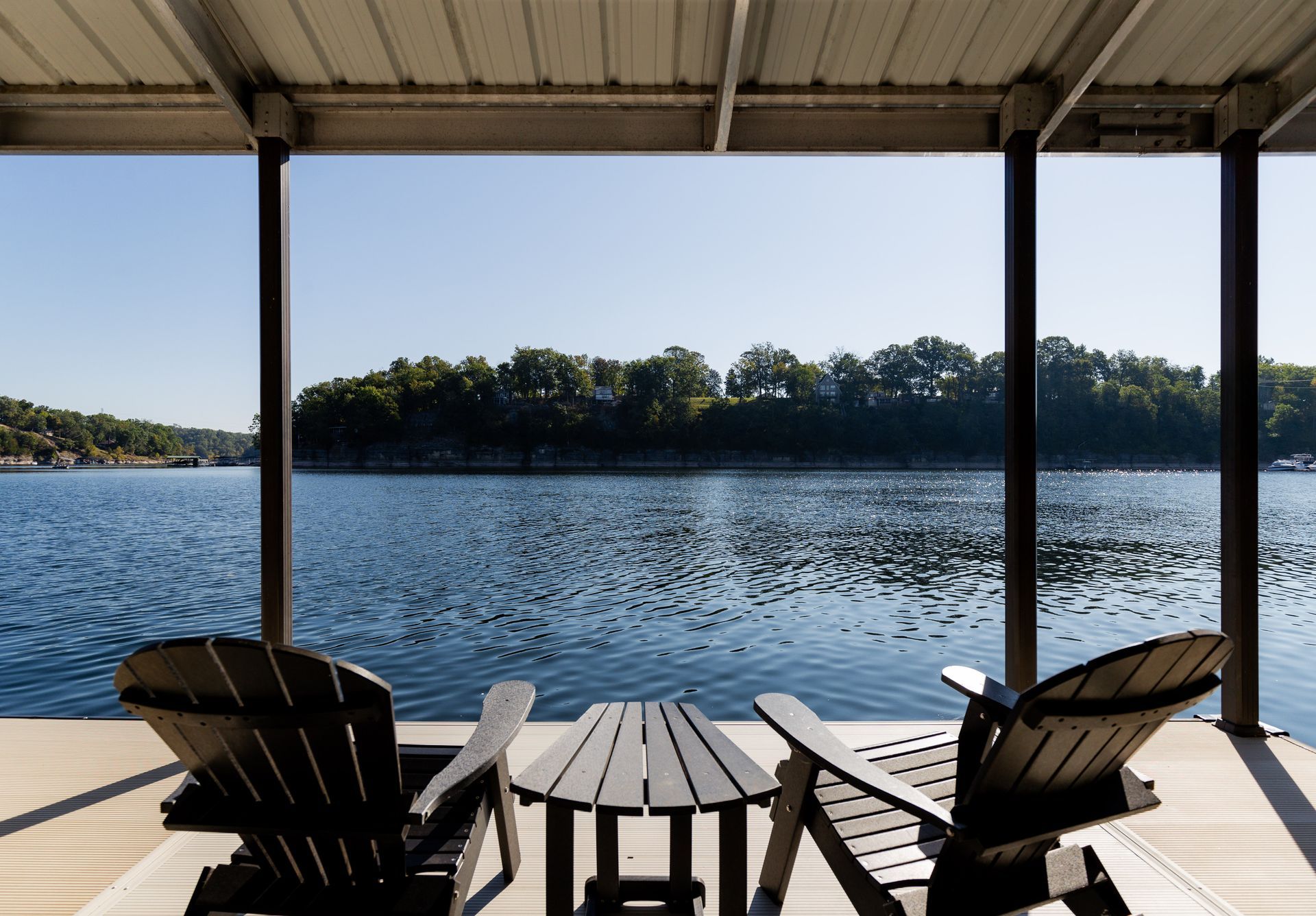 Two Chairs and A Table on A Dock Overlooking a Lake - Dock Solutions of Kentucky | Lexington, KY
