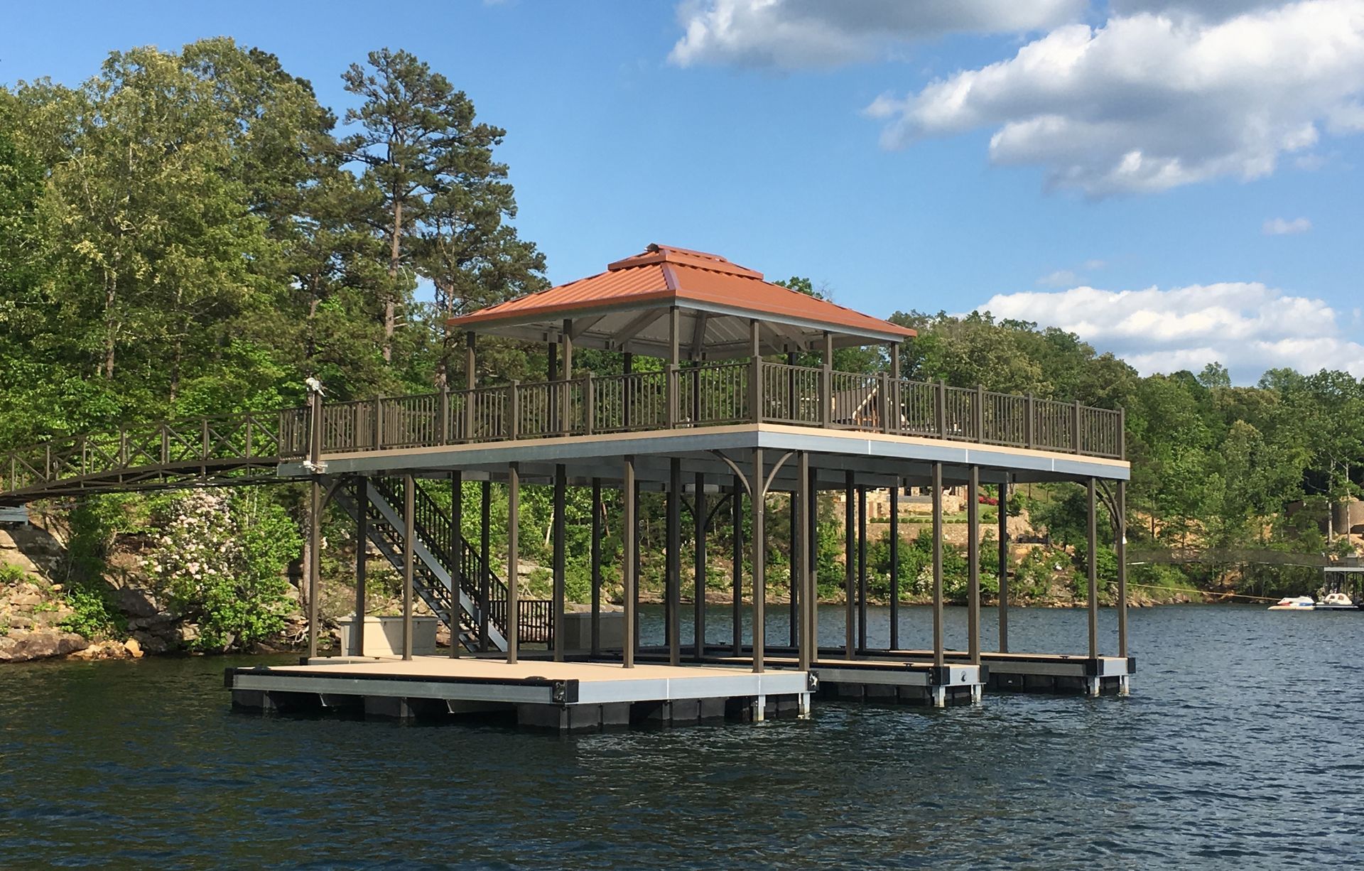 Our new copper metallic roof panels accompanied by our popular burnished slate posts & railing and buckskin decking - Dock Solutions of Kentucky | Lexington, KY