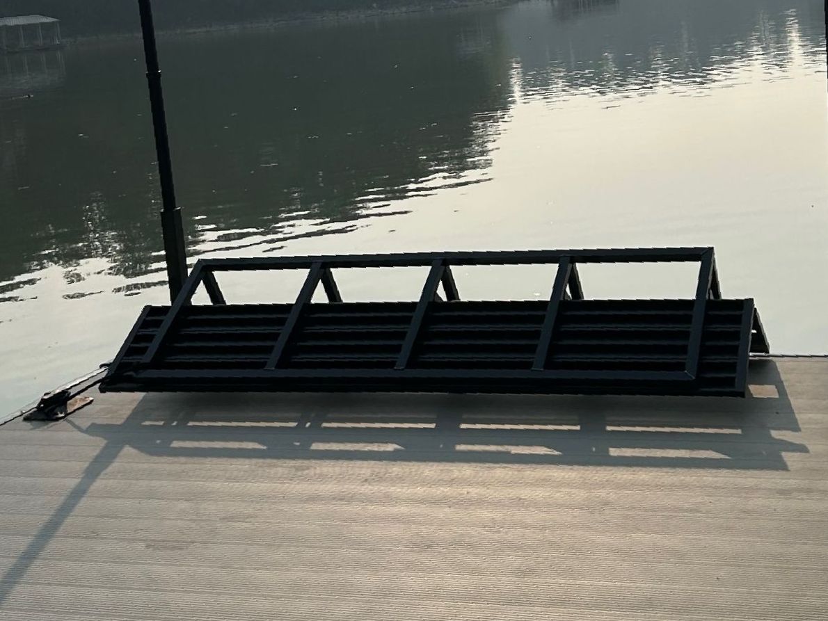 Bench Is Sitting on A Dock Next to A Body of Water - Dock Solutions of Kentucky | Lexington, KY