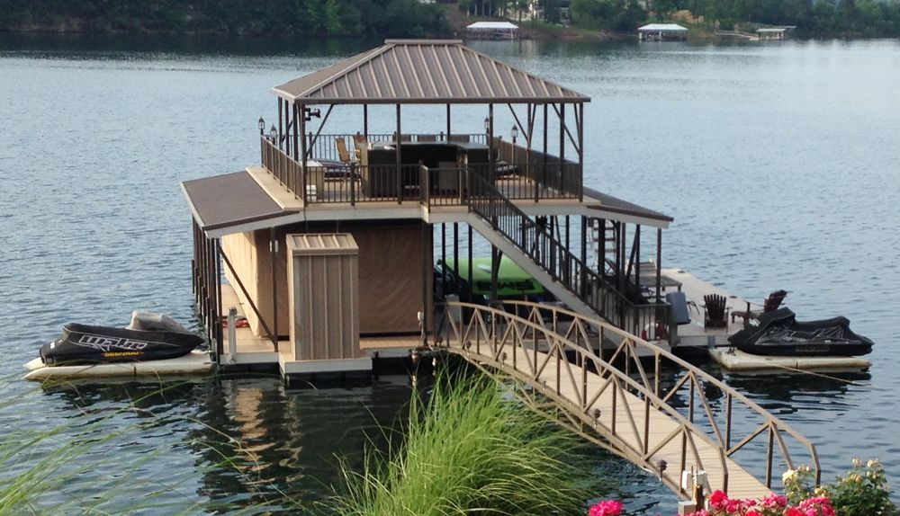 Buckskin decking with burnished slate roofs and railings. Shown with dock closet, full size swim platform and PWC ports. - Dock Solutions of Kentucky | Lexington, KY