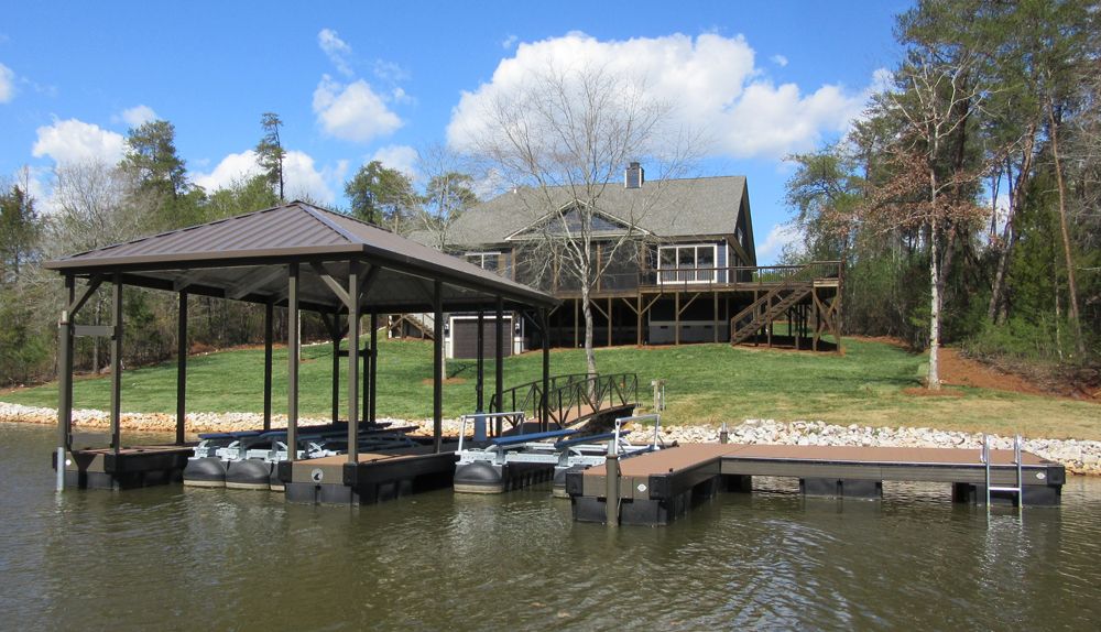 Custom hip roof boat dock. Shown with swim platform and optional full frame powder coating - Dock Solutions of Kentucky | Lexington, KY