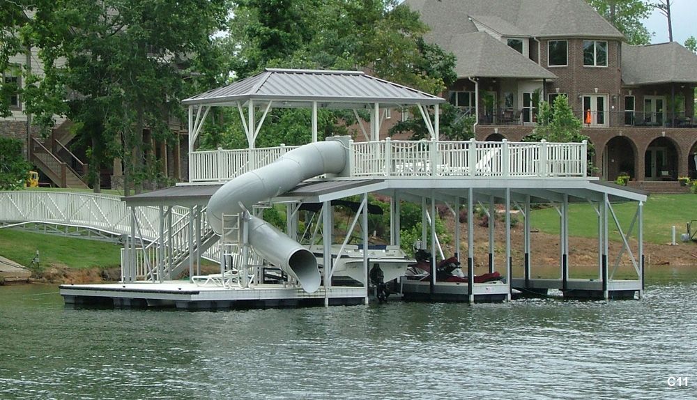 Silverstone decking and railing, burnished slate roof, with swim platform, swim ladder, hip shade, and custom slide - Dock Solutions of Kentucky | Lexington, KY