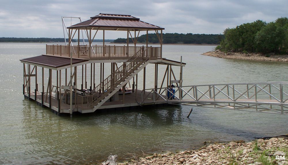 Buckskin roof and railings, brown roof, with PWC slip, super swing, and hip shade with decorative ridge - Dock Solutions of Kentucky | Lexington, KY