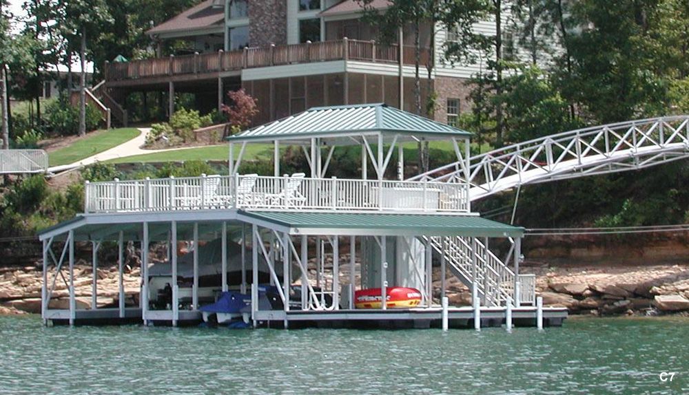 Silverstone decking and railing, hunter green roof, with swim platform, swim ladder, and hip shade - Dock Solutions of Kentucky | Lexington, KY