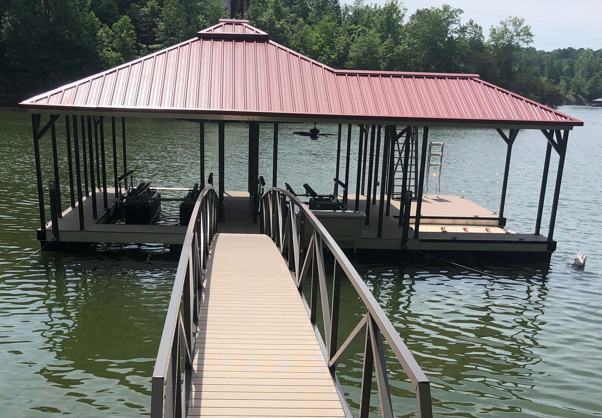 Custom L-shape hip roof with rustic roof and buckskin decking - Dock Solutions of Kentucky | Lexington, KY