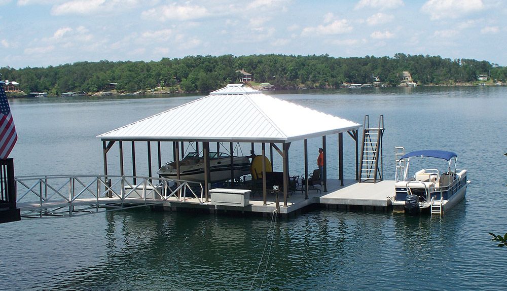 Single slip hip roof boat dock with covered seating area and 3/4 size swim platform - Dock Solutions of Kentucky | Lexington, KY