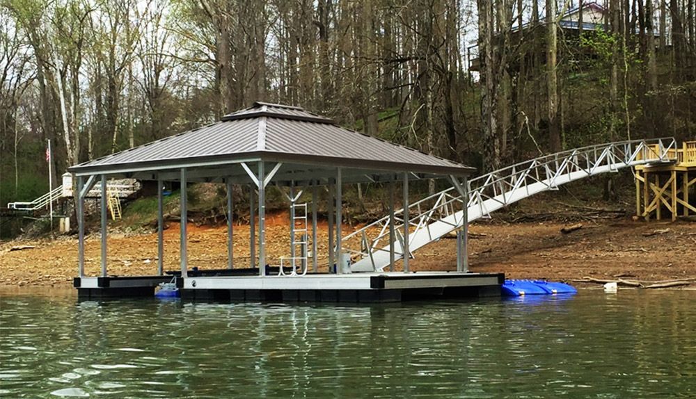 Standard single slip hip roof boat docks with 3/4 swim platform - Dock Solutions of Kentucky | Lexington, KY
