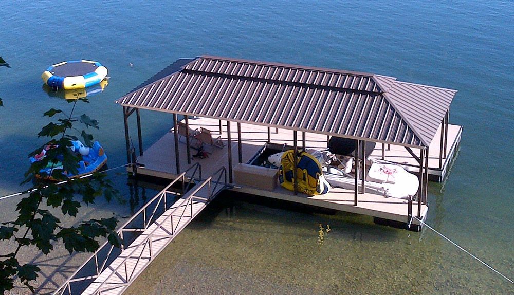 Custom horizontal oriented single slip hip roof boat dock - Dock Solutions of Kentucky | Lexington, KY