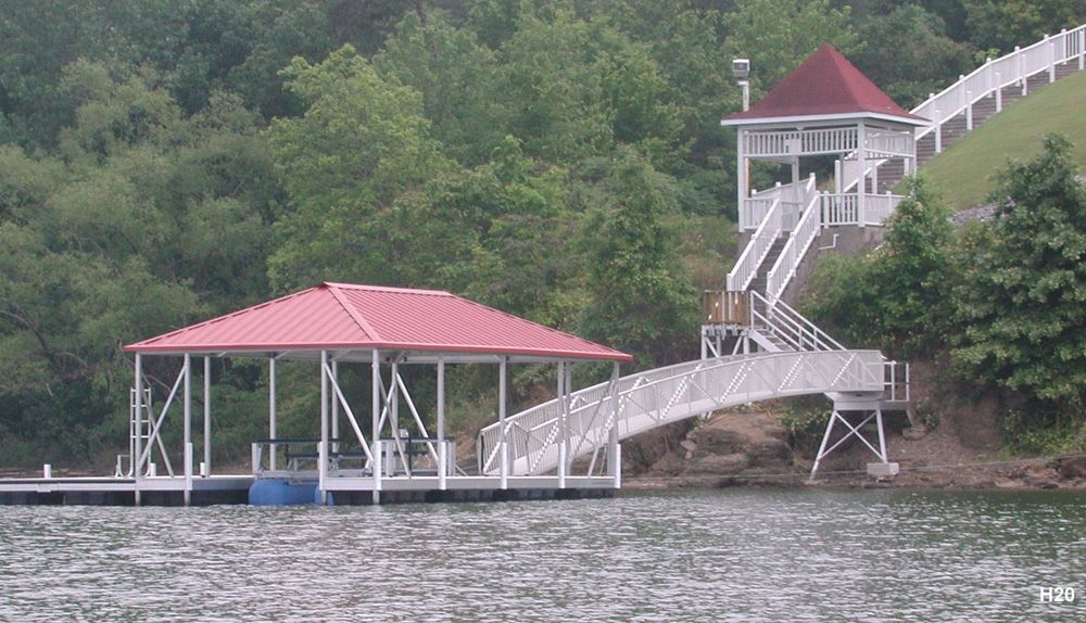 Silverstone decking and railing, crimson roof, with full-length swim platform, swim ladder, and elevation stairs - Dock Solutions of Kentucky | Lexington, KY