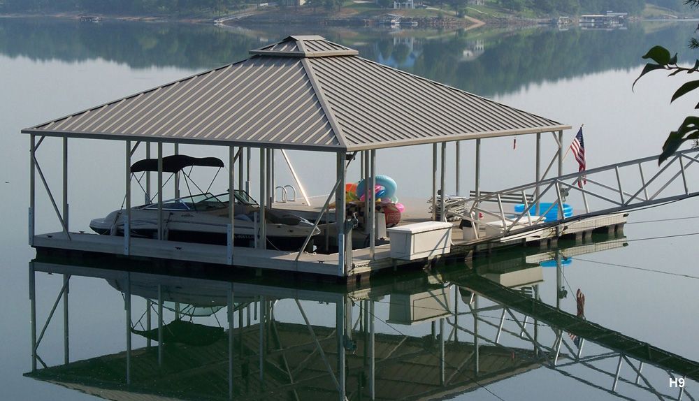 Silverstone decking, desert roof, with full-length swim platform, PWC slip with fill-in, swim ladder, and dock lockers - Dock Solutions of Kentucky | Lexington, KY
