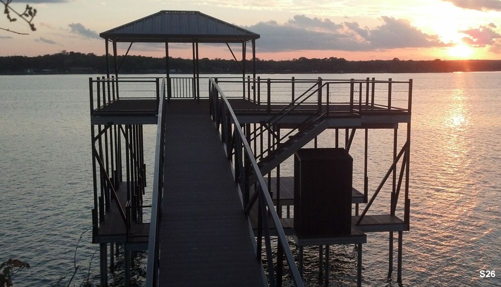 Woodgrain decking, burnished slate roof and railings, in custom L-shape with swim platform, closet, and hip shade - Dock Solutions of Kentucky | Lexington, KY