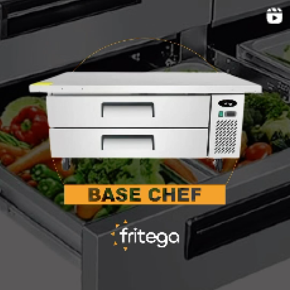 A picture of a base chef with vegetables in it