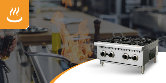 A stove top oven is sitting on a table in a kitchen.