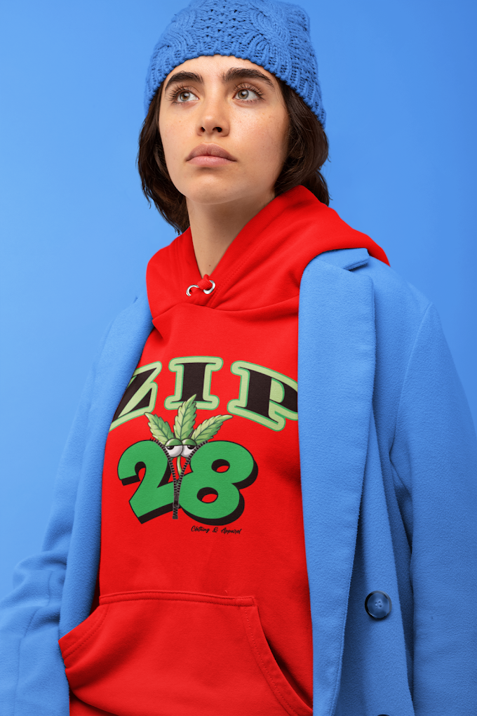 A woman wearing a red hoodie with the number 28 on it