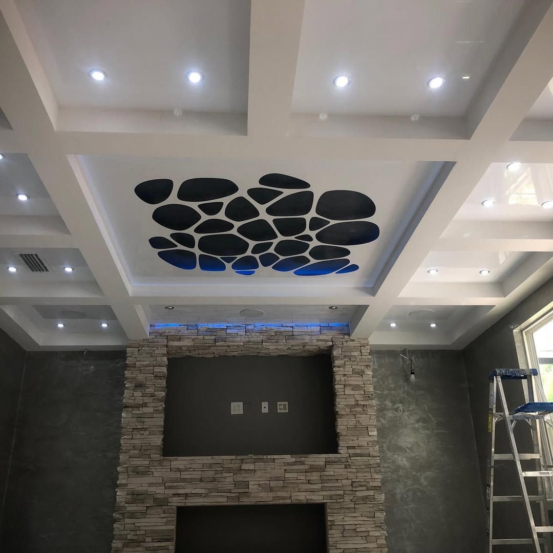 A bathroom with a bathtub and a large window.