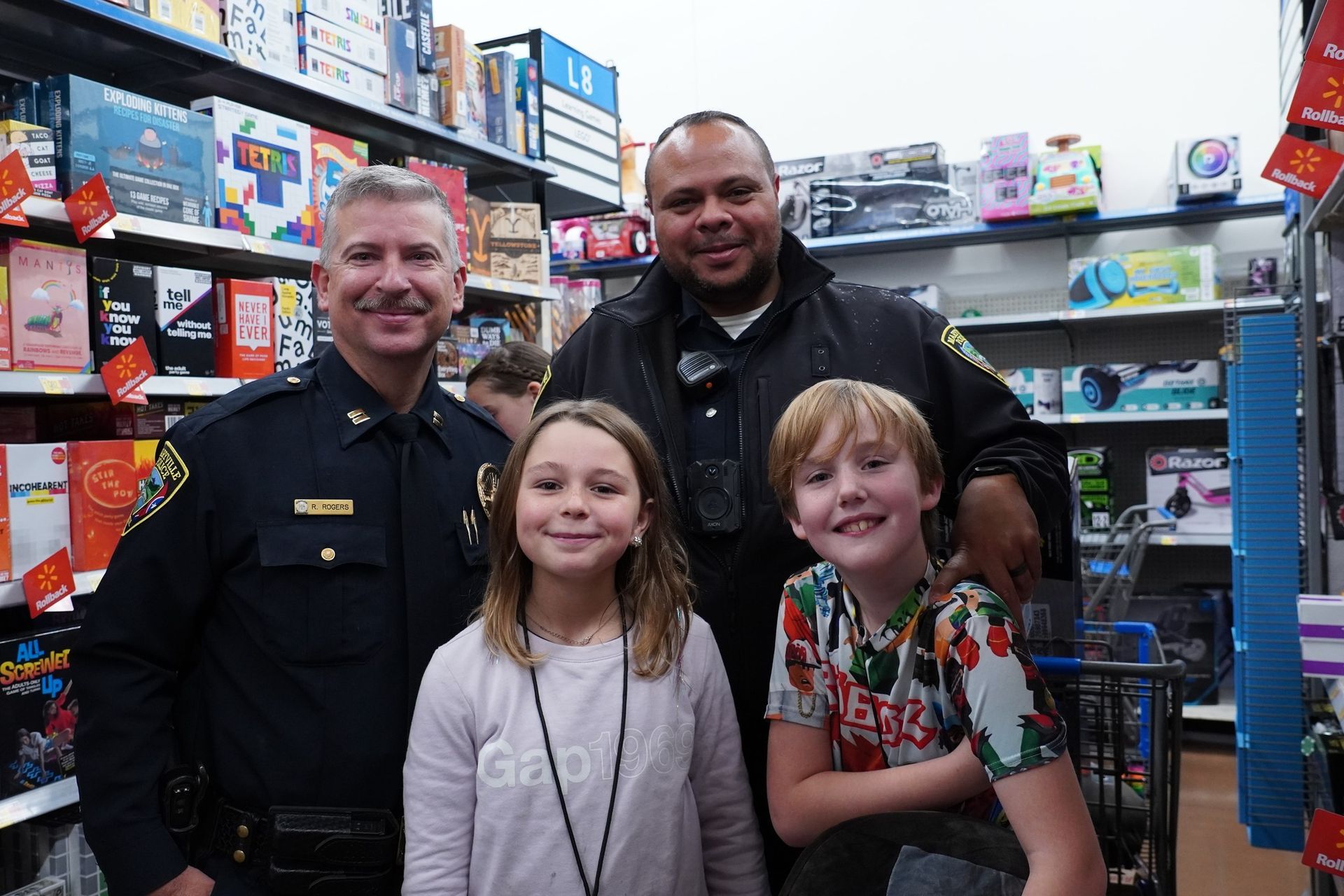 A group of people are posing for a picture in a store.