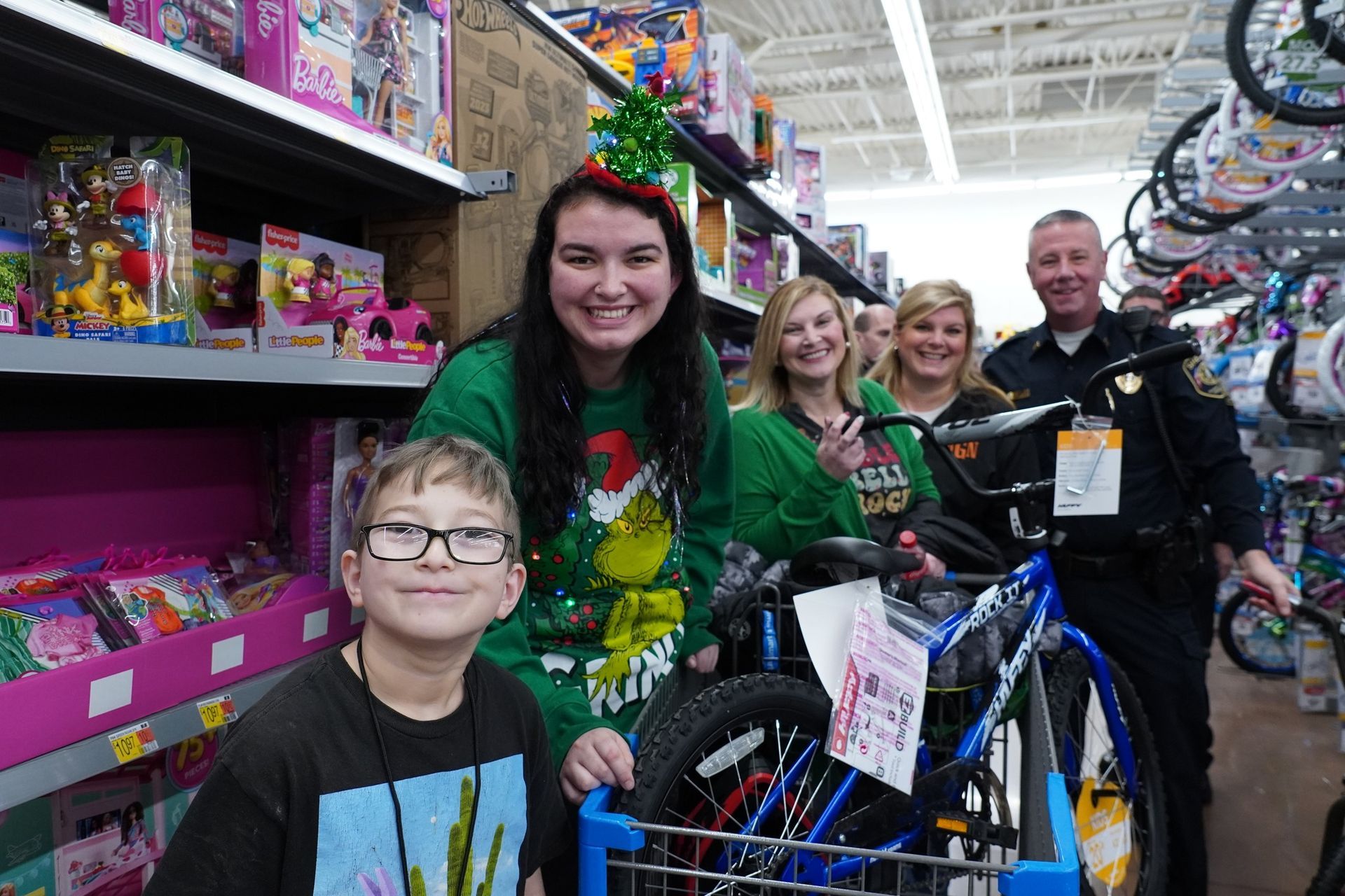 A group of people are standing next to each other in a store.
