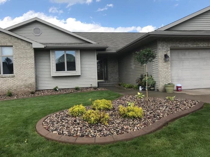 Stone Landscaping in Front Yard — Menasha, WI — Vargas Brothers LLC