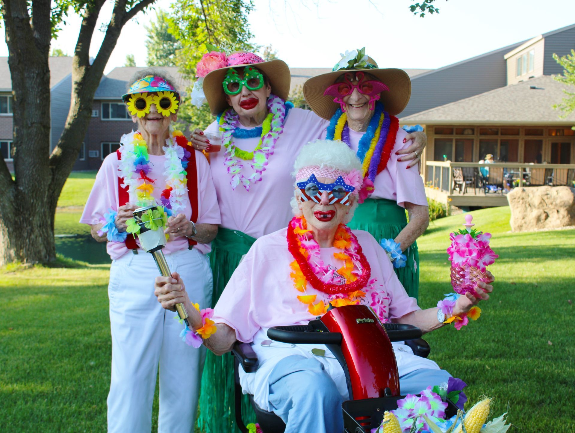 A group of elderly women are posing for a picture