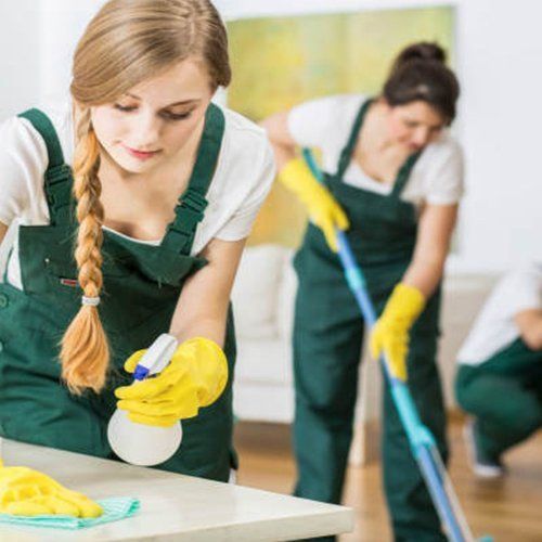 two girls cleaning