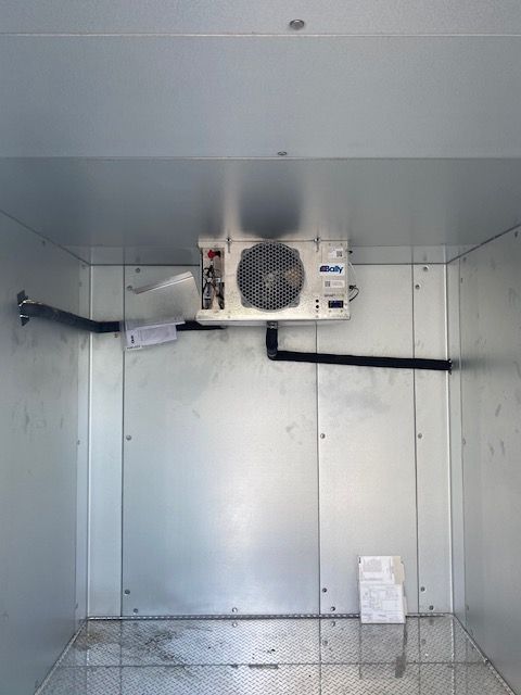 view of a commercial refrigerator cooling unit