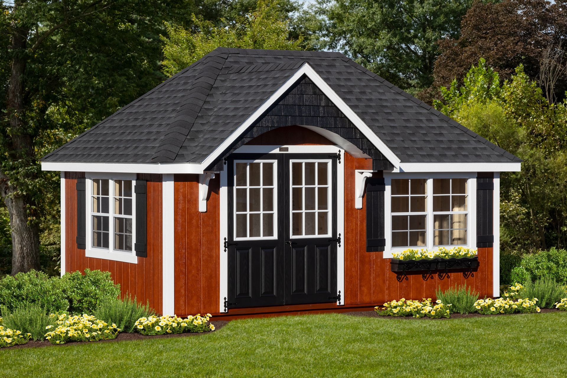 A gazebo with a table and chairs in the middle of a grassy field