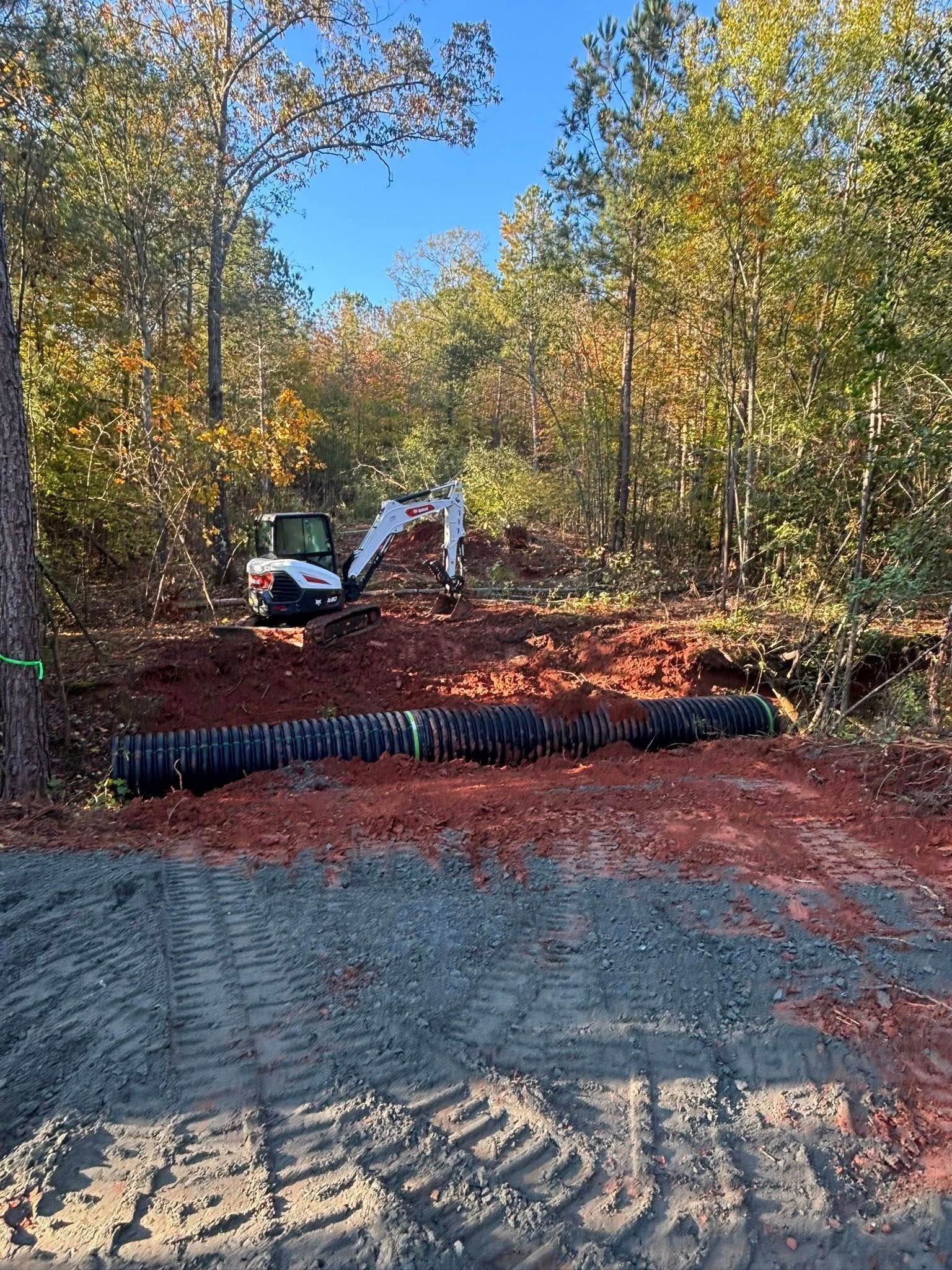 The inside of a moving truck filled with boxes and blankets.