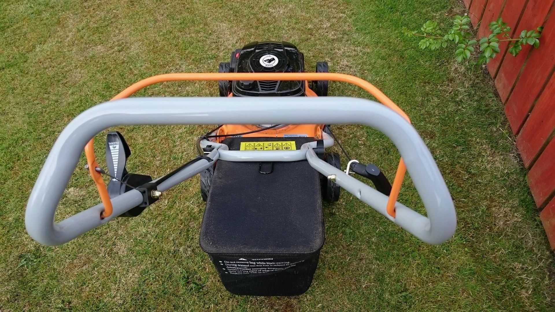 Operator's view of a Cyril Johnston Tiger brand TM4016HP petrol push mower. 