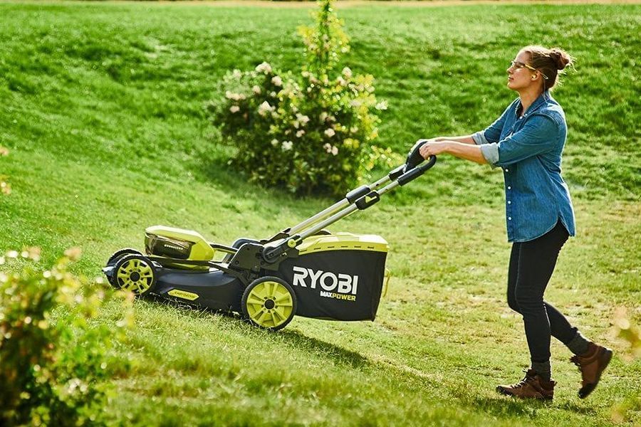 Photograph of a Ryobi MaxPower cordless, battery electric lawnmower.
