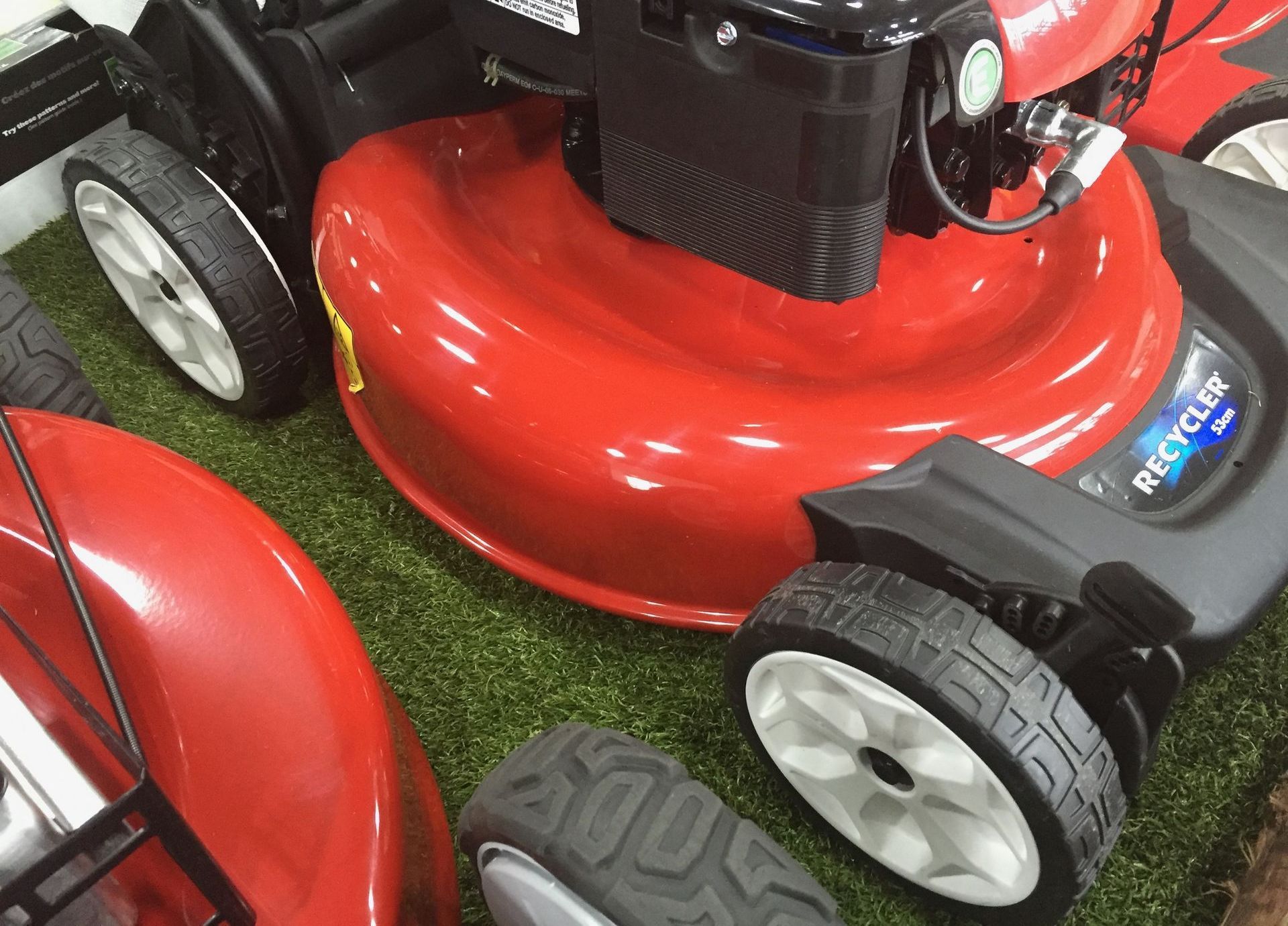 Photograph of a TORO 53cm petrol engine Recycler lawnmower.