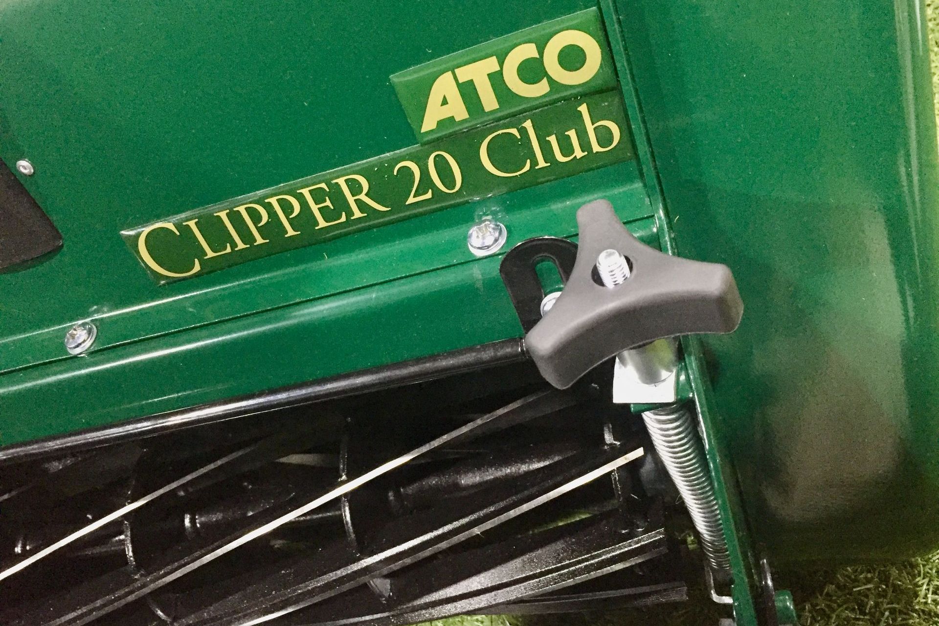 Photograph of the height adjustment mechanism, fitted to an ATCO Clipper 20 petrol powered, cylinder mower.