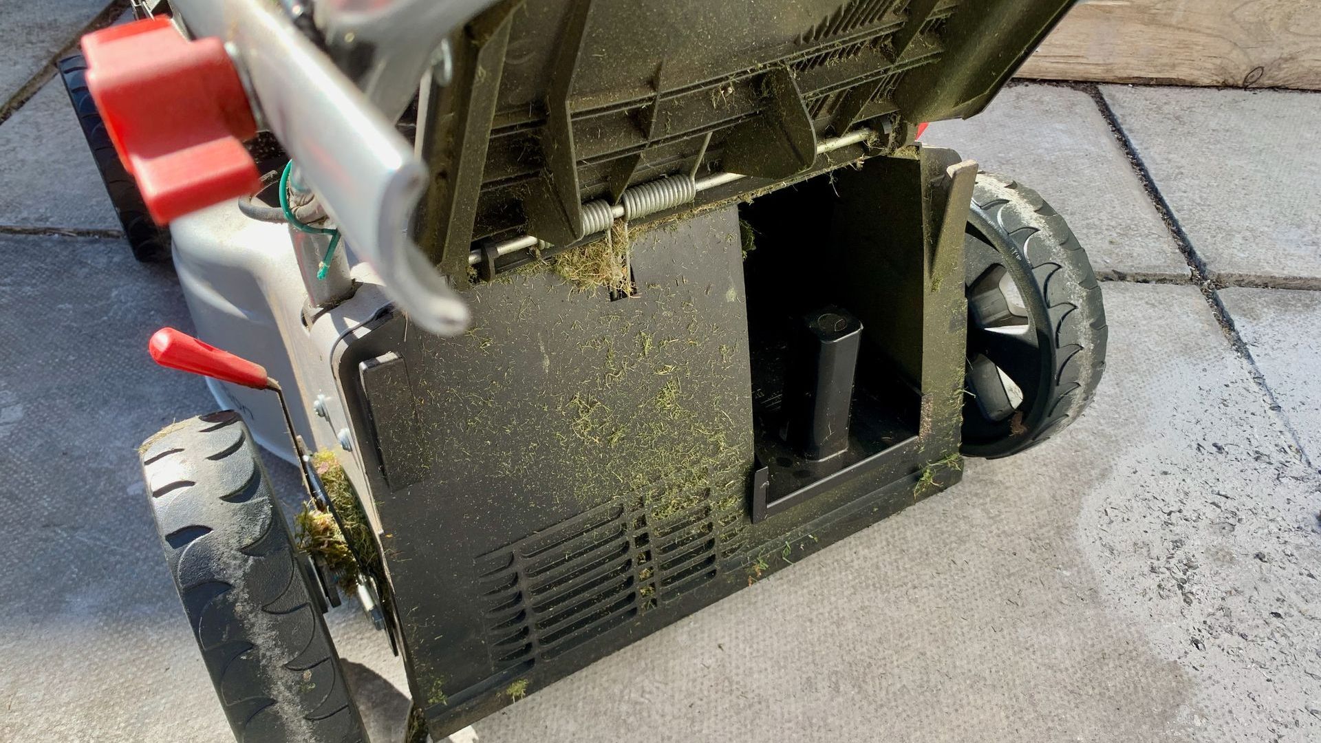 Photograph of the start switch of a Greenworks cordless li-ion lawnmower.