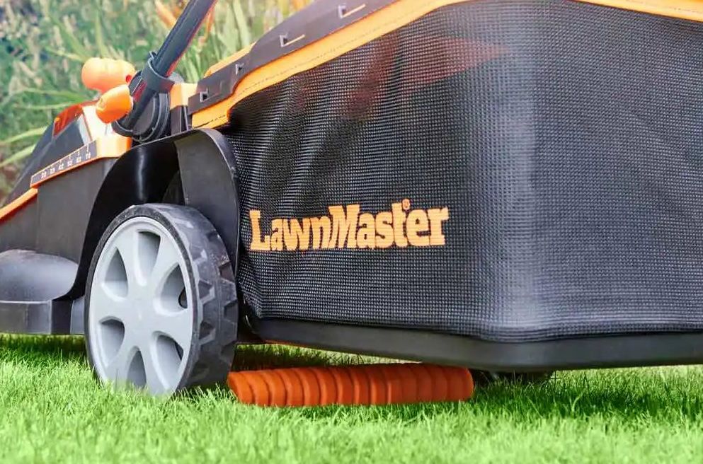 Rear view of a LawnMaster 48-volt, 41cm lithium ion battery powered, 41cm cordless combi mower, showing real roller.