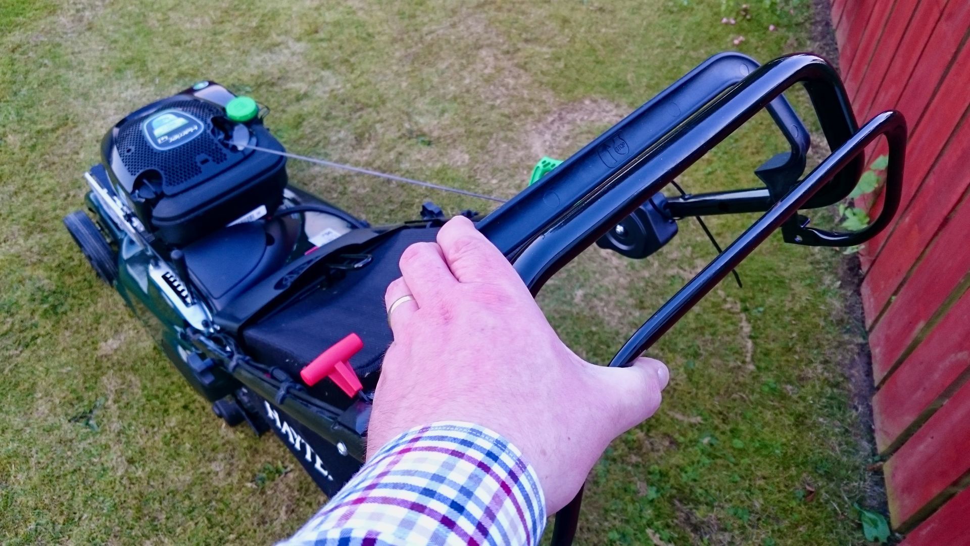 Operator's view of a Hayter Harrier 41 self-propelled petrol mower with Autodrive. 