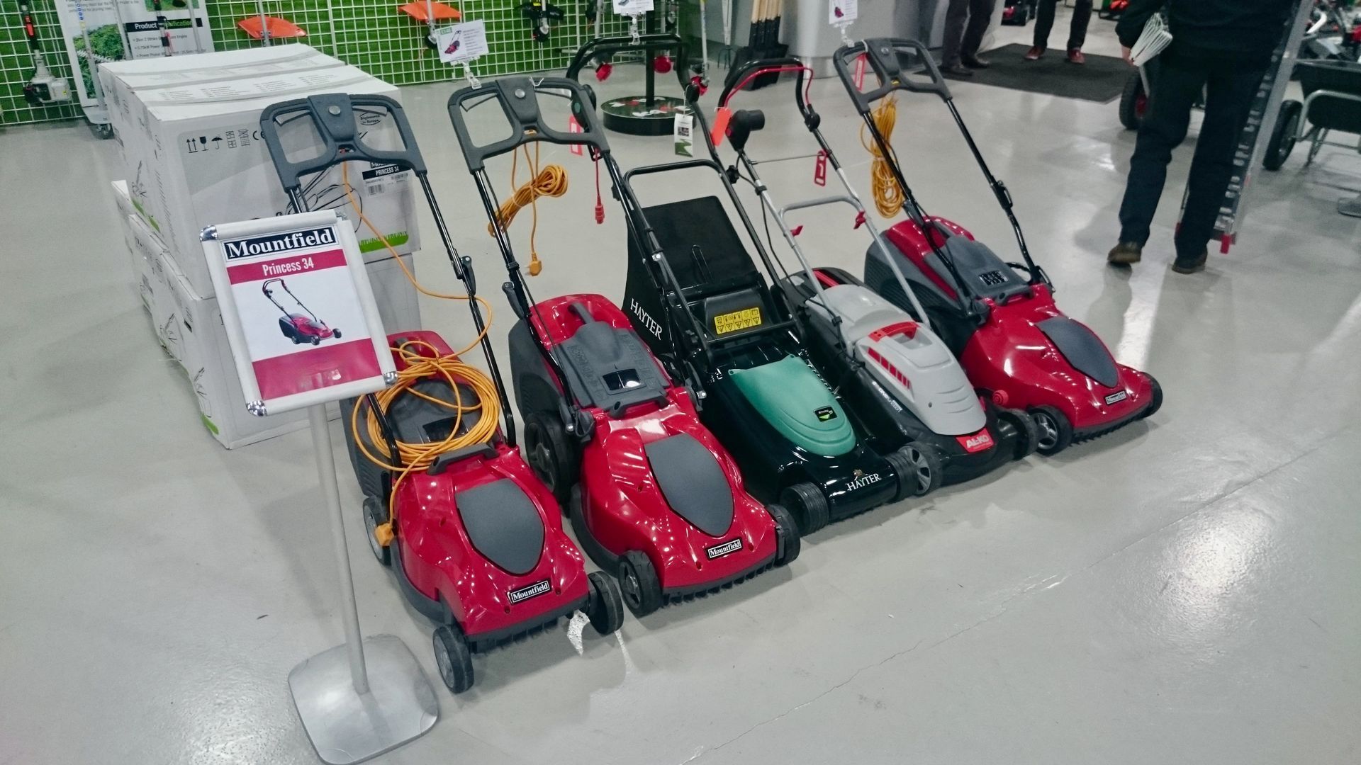 A selection of electric lawnmowers for sale in the Cyril Johnston Retail Showroom, near Carryduff, Belfast, United Kingdom.