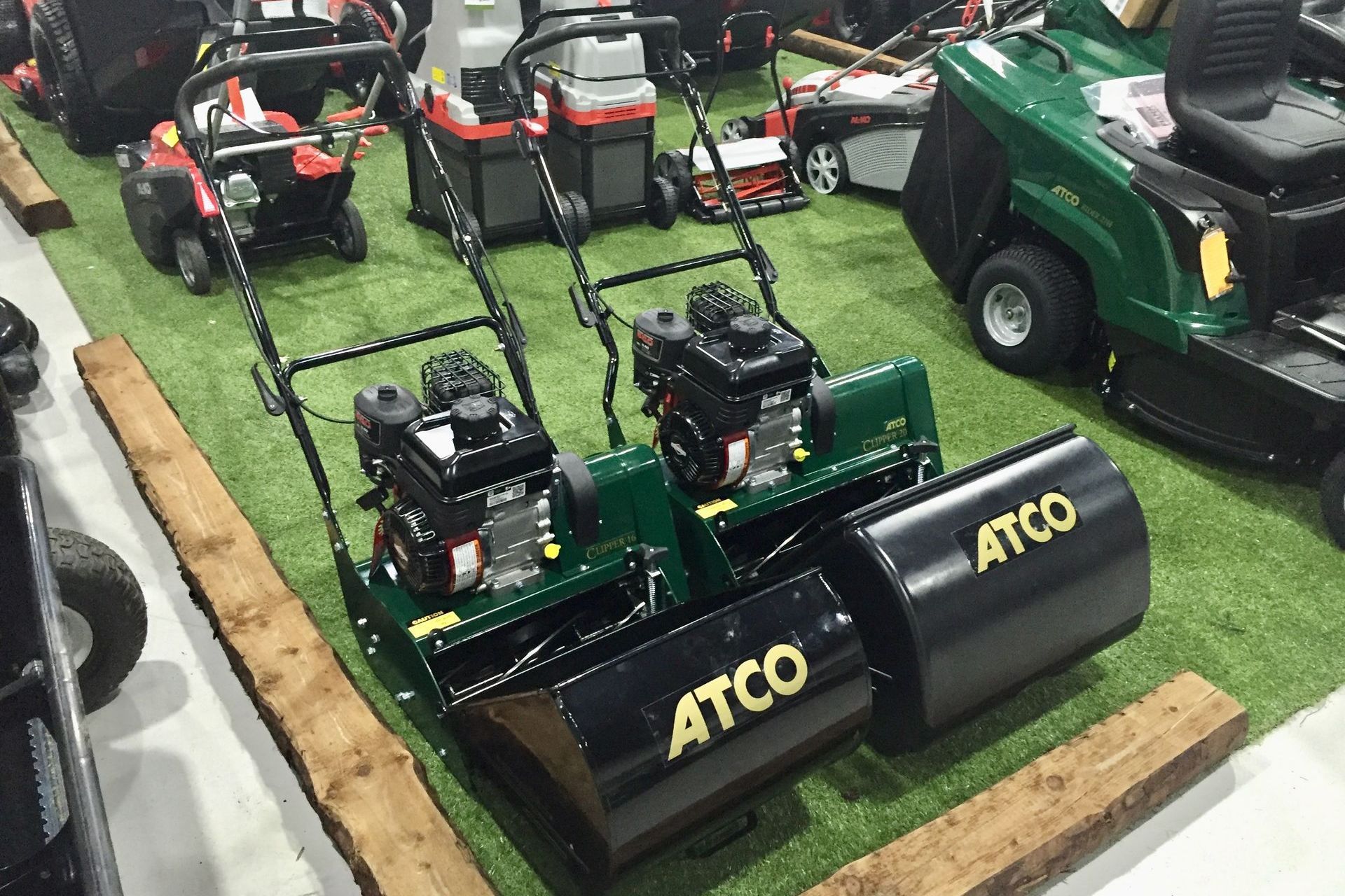 Photograph of two ATCO Clipper petrol cylinder mowers, on sale at the Cyril Johnston Retail Showroom, Belfast, UK.