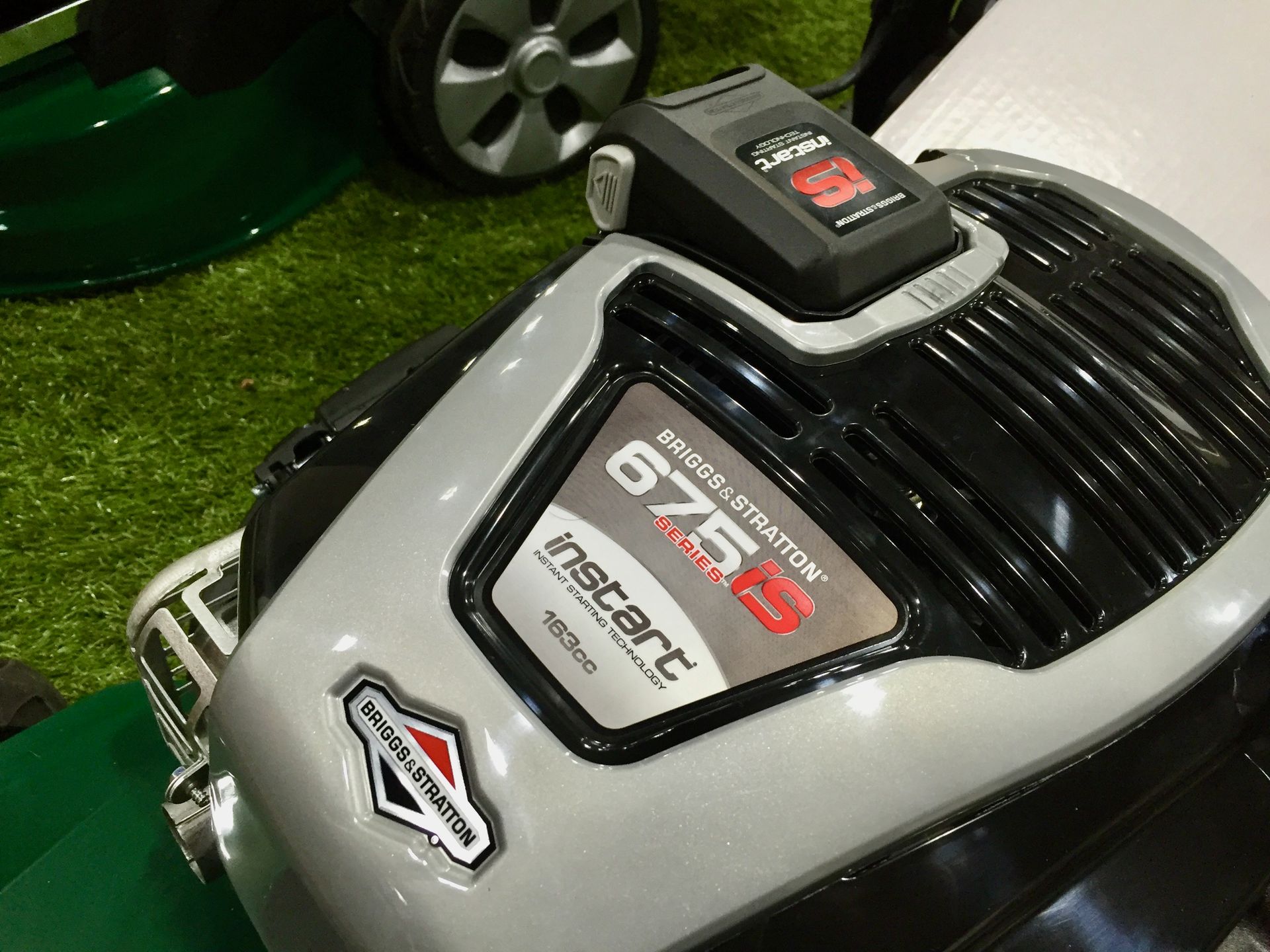 Photograph of a Briggs & Stratton 675iS inStart series engine, fitted to an ATCO lawnmower.