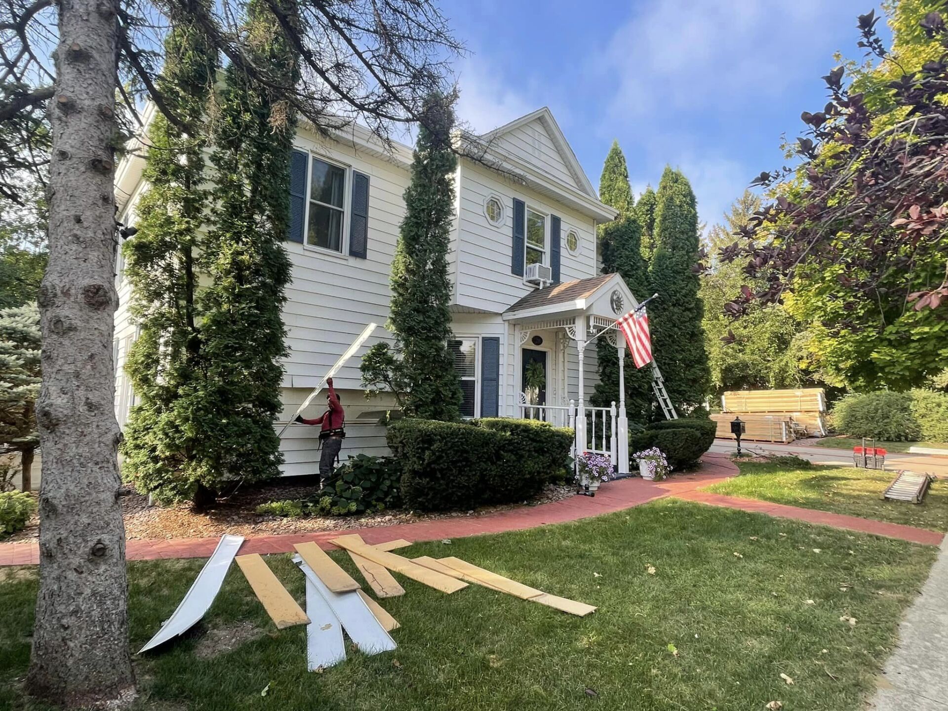 Removing old siding — Omaha, NE — R & C Home Improvements